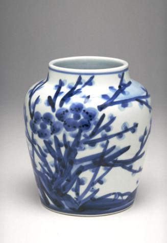 Vase with flowering plant decoration