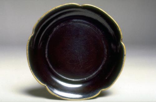 Lobed dish, one of a pair