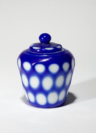 White faceted covered jar with blue overlay