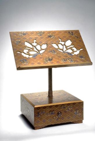 Reading stand with butterflies on floral lozenge lattice