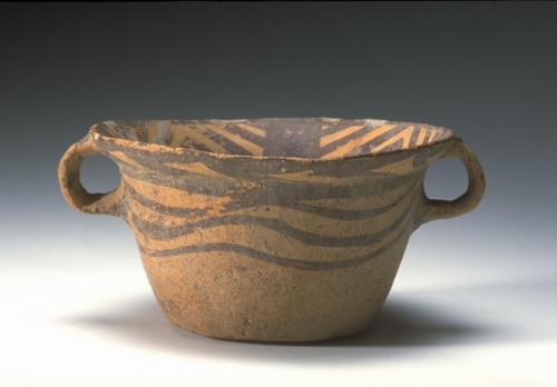 Cup-like container with broad, splayed mouth and two lug handles