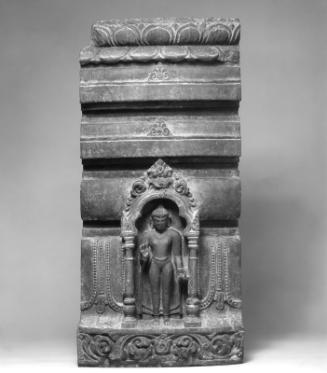 Section of the base of a stupa with standing Buddha