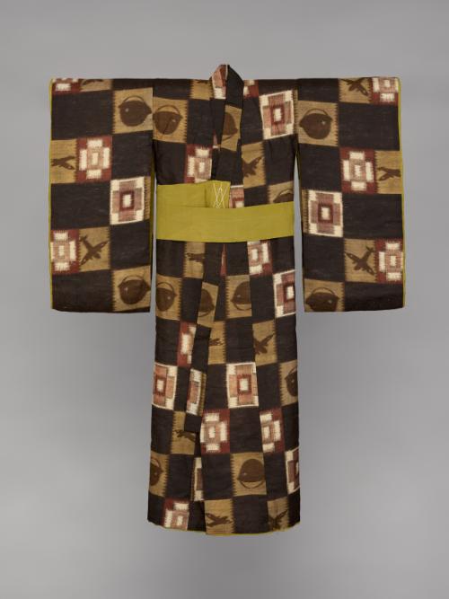 Infant boy's kimono with design of airplanes in flight and helmets