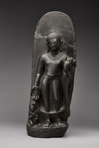 Standing Buddha with devotee