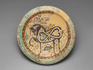 Dish with design of horse and cheetah