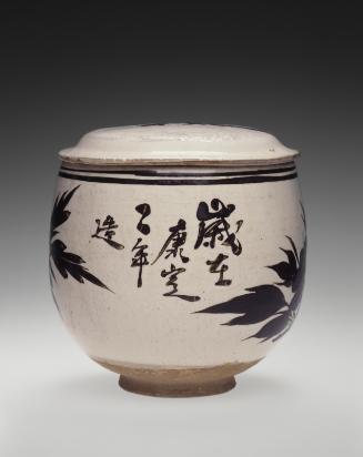 Covered jar with design of floral sprays and calligraphy