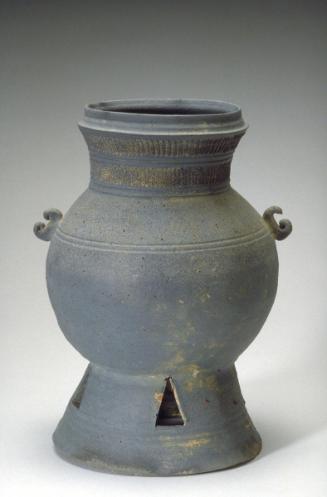 Pedestal jar with foot