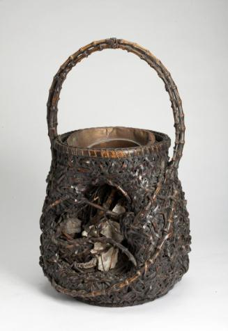 Flower basket with oyster shell decoration