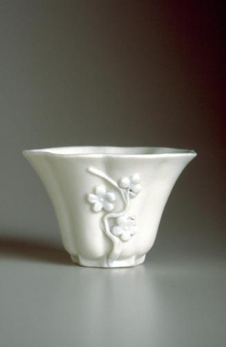 Cup with plum blossom