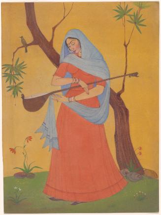 Woman holding a sitar