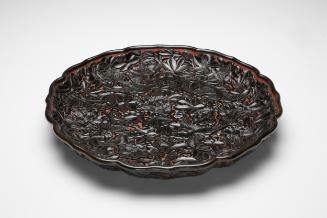 Plate with flying birds amid flowers