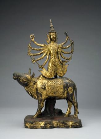 Shiva on the bull Nandi, carrying the Buddha on his head