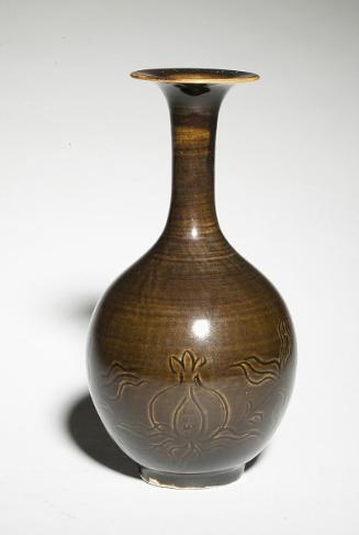 Vase with pomegranate